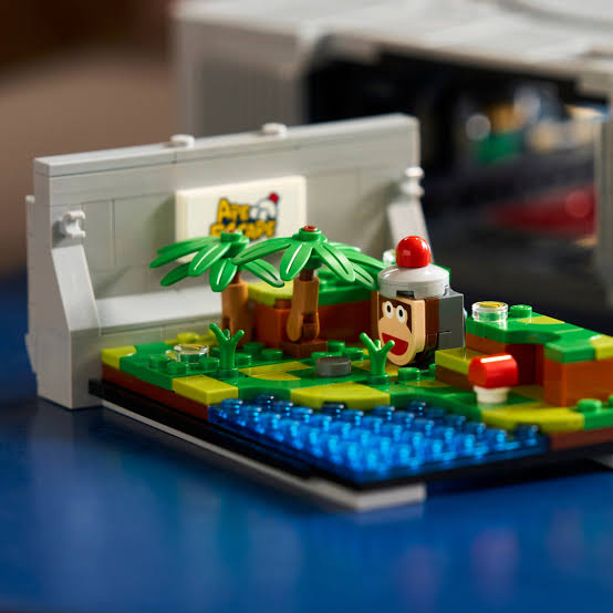 LEGO PlayStation Ape Scape diorama — miniature track with scaled-down cars
